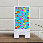 Cute Pattern In Hippie Style With Colorful Flowers And Peace Symbol On Blue Background Phone Holder