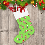 Merry Christmas Teddy Bear In Red Hat On Green Christmas Stocking