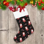 Cute Santa Claus And Christmas Candies On Black Background Christmas Stocking