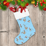 Christmas With Penguin And Seal On Blue Christmas Stocking