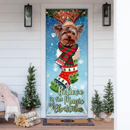 Believe In The Magic Of Christmas. Yorkshire Terrier In Sock Door Cover