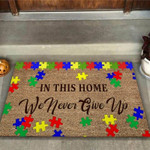 In This Home We Never Give Up Autism Awareness Coir Pattern Print Doormat - 1