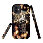 The light shines in the darkness John 1:5 Bible verse phone case