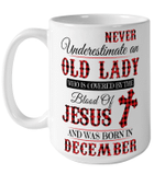 Never Underestimale An Old Lady Who Is Covered By The Blood Of Jesus And Was Born In December Mug