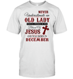 Never Underestimale An Old Lady Who Is Covered By The Blood Of Jesus And Was Born In December Shirt